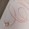 Caramelo antivuelco personalizado detalles en rosa bebé